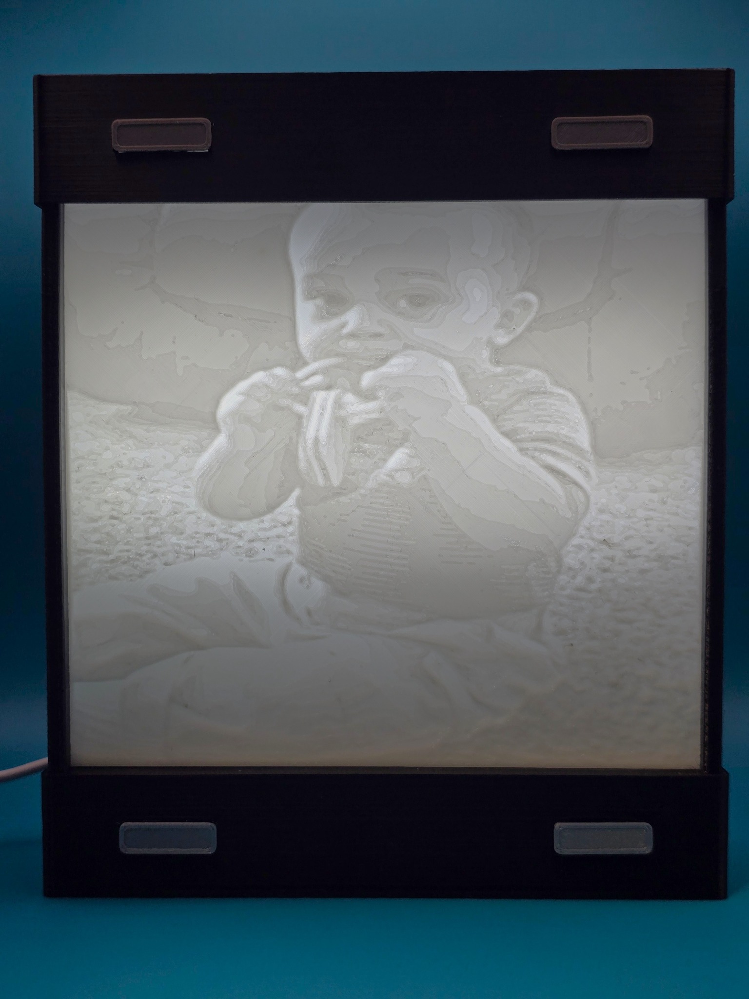 Illuminated lithophane Memory Frame presentation